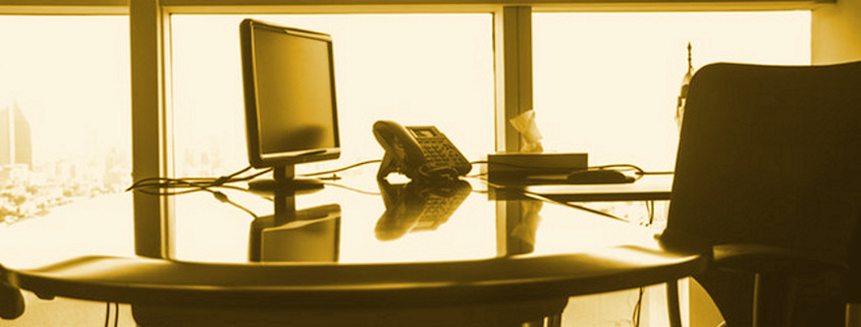 get-in-touch-gold Shrum Disney & Associates office desk overlooking Nashville